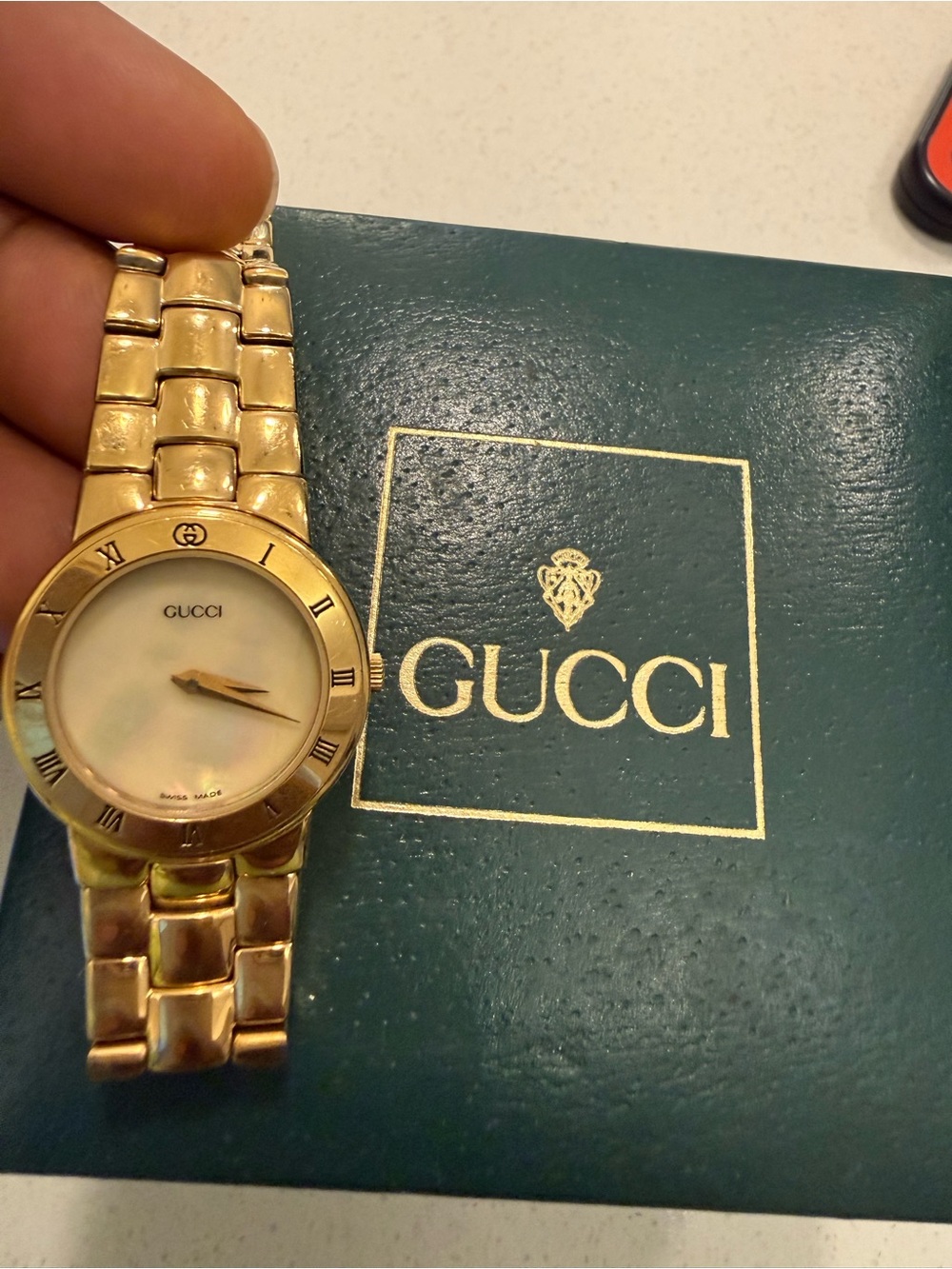 Gucci Gold-Tone Mother of Pearl Dial Bracelet Watch